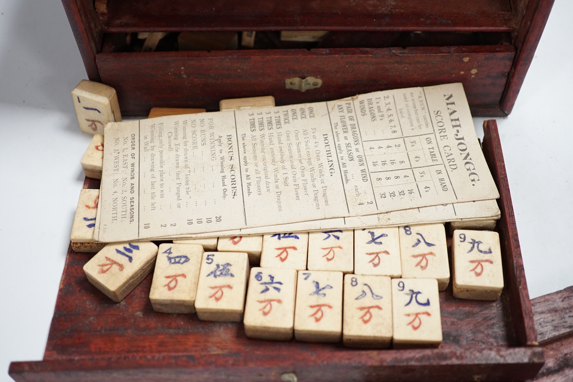 A Chinese Mah jong set, 24cm wide